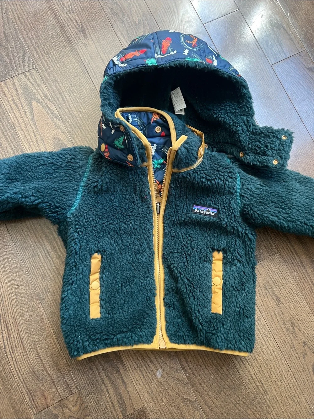 Patagonia Navy Surf Print Reversible Tribbles Jacket with hood size 2T